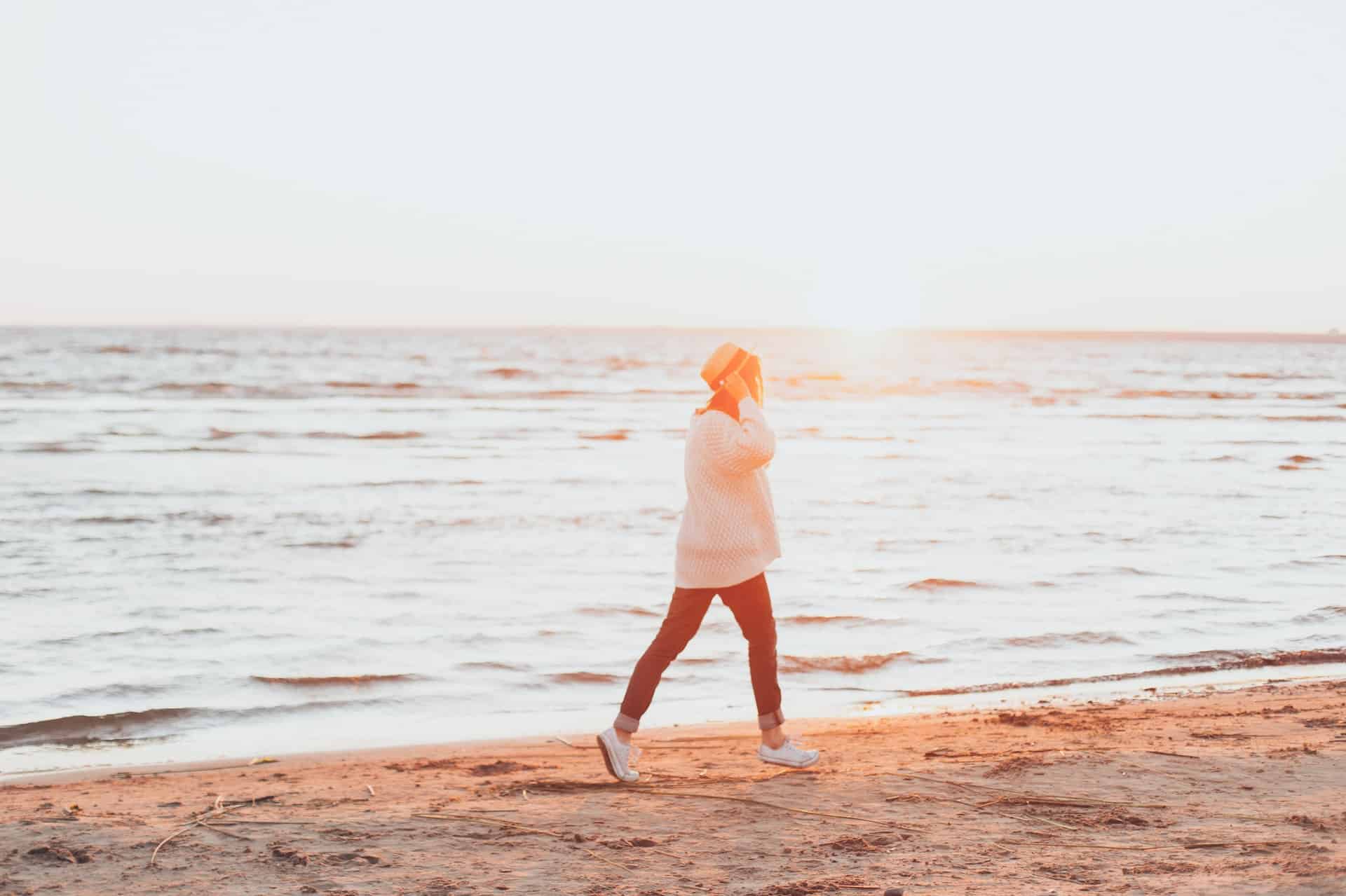 Woman walking on a beach