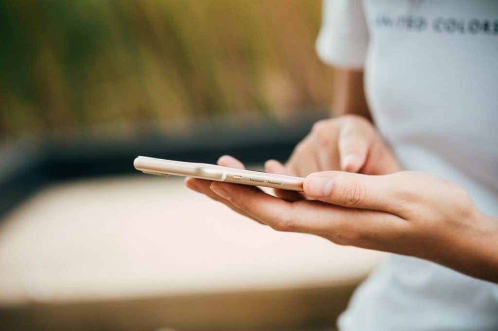 Hands holding a smartphone