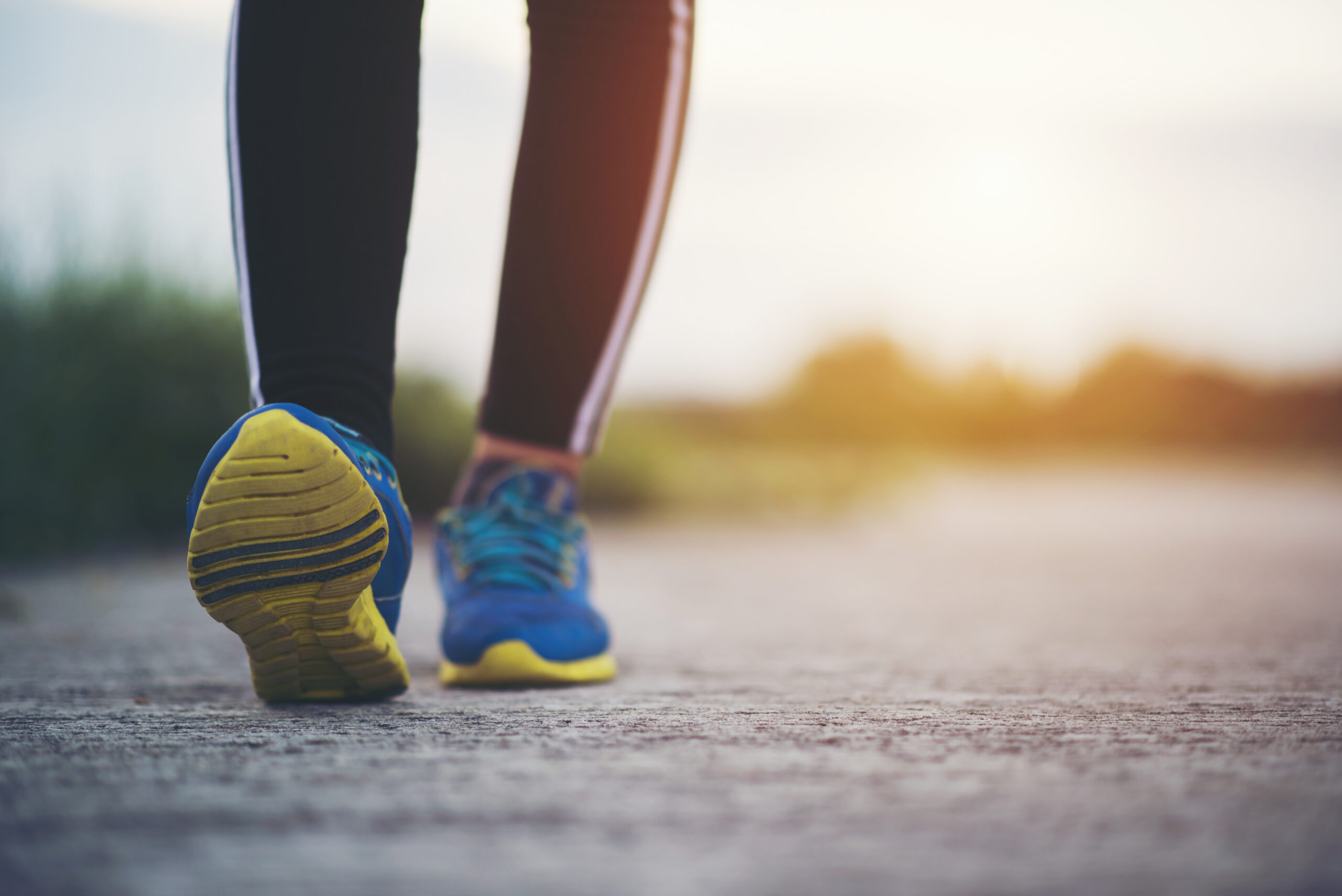 Close up photo of sneakers on a walk
