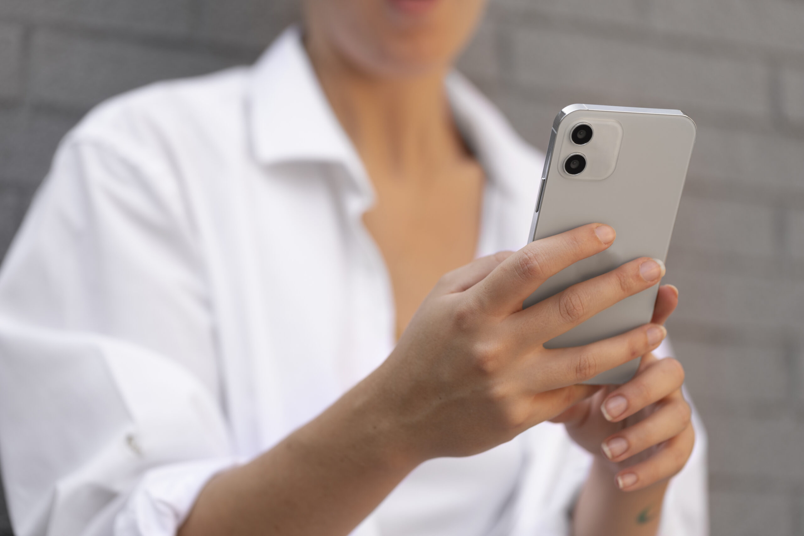 close-up-hands-holding-phone